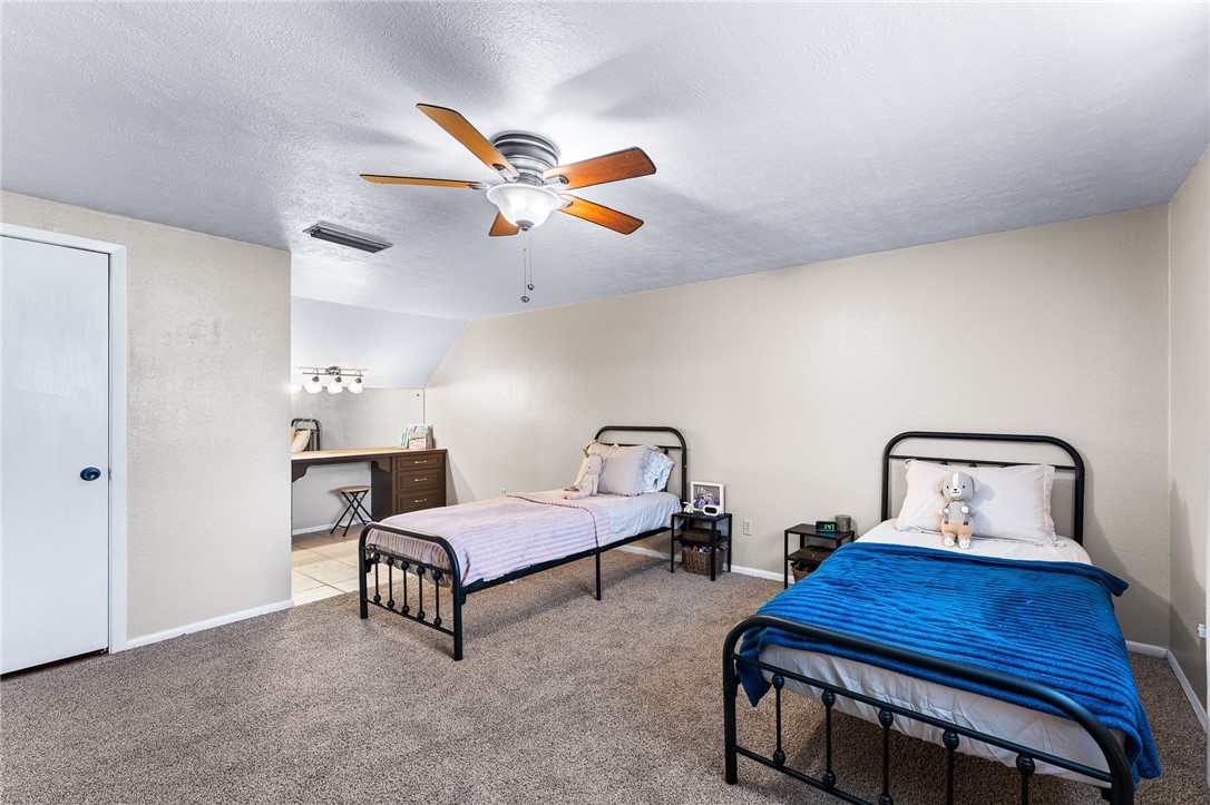 4325 St George Drive Corpus Christi, TX 78413 - Photo 21 of 22 a bedroom with furniture and a window