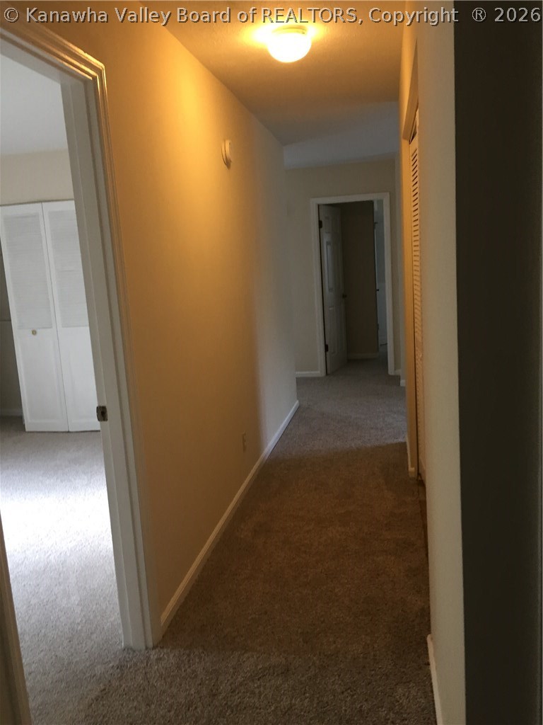 402 Powderhorn Road Charleston, WV 25314 - Photo 19 of 29 hallway. laundry is in hallway