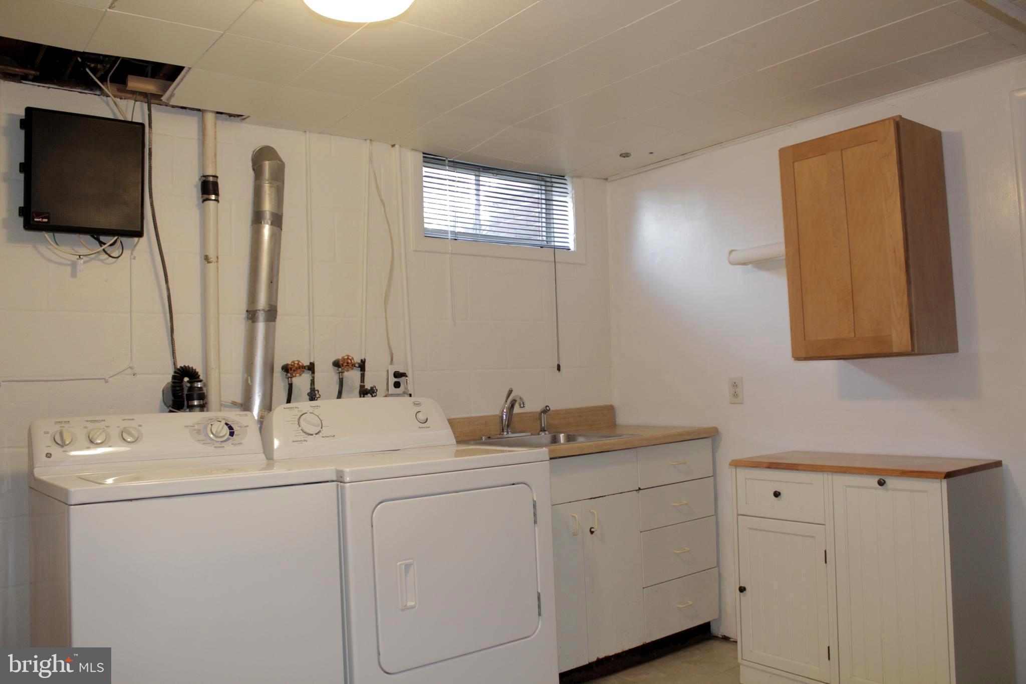 112 17th Avenue Baltimore, MD 21225 - Photo 24 of 40 a view of bathroom with dual sinks