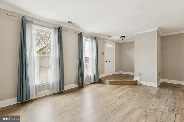a view of livingroom with hardwood floor and window
