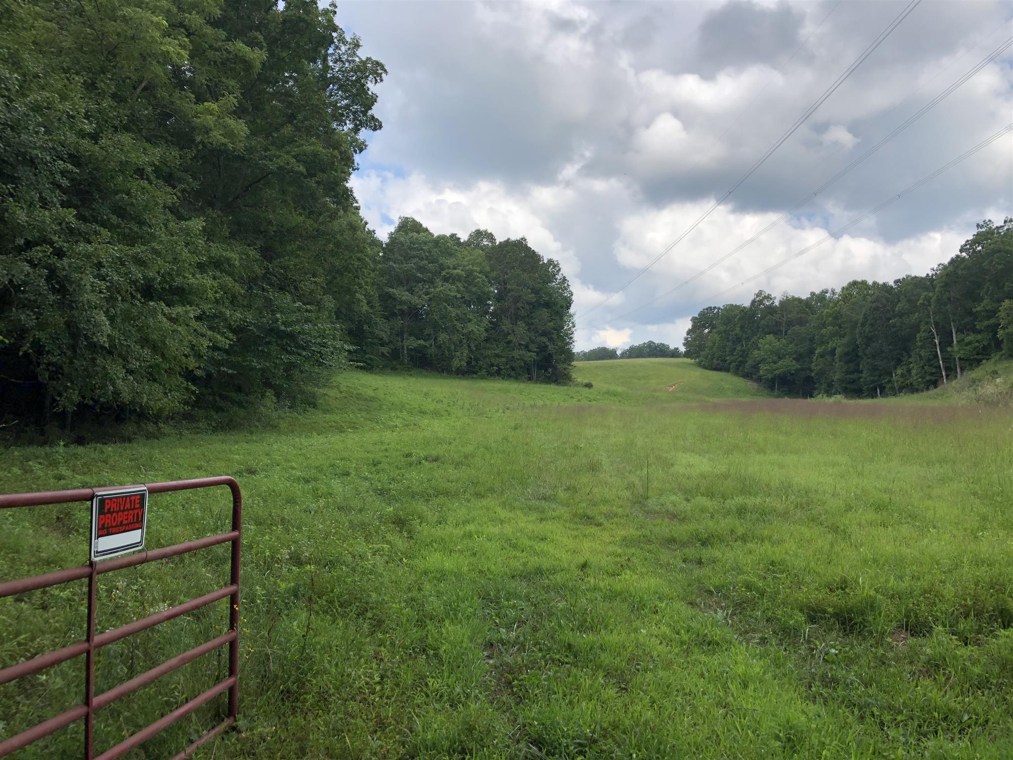 0 Garners Creek Road Dickson, TN 37055 - Photo 3 of 17 a view of a wooden fence and a big yard