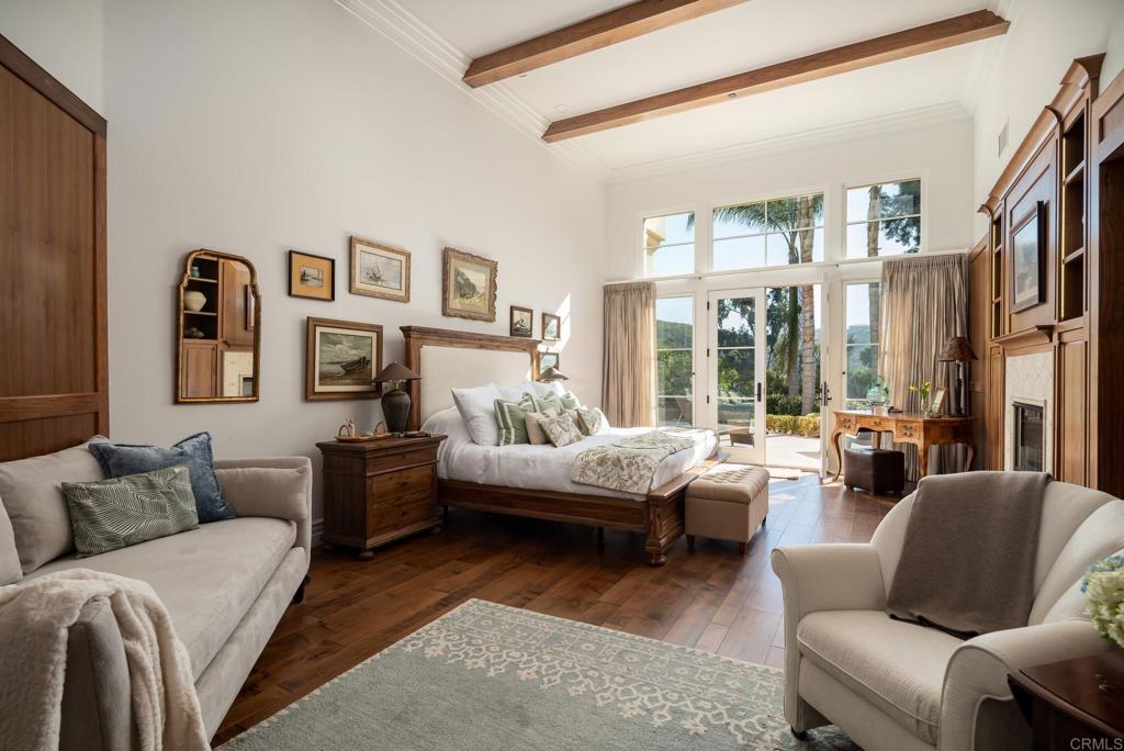 14479 Emerald Lane Rancho Santa Fe, CA 92067 - Photo 20 of 52 a living room with furniture large windows and a large window