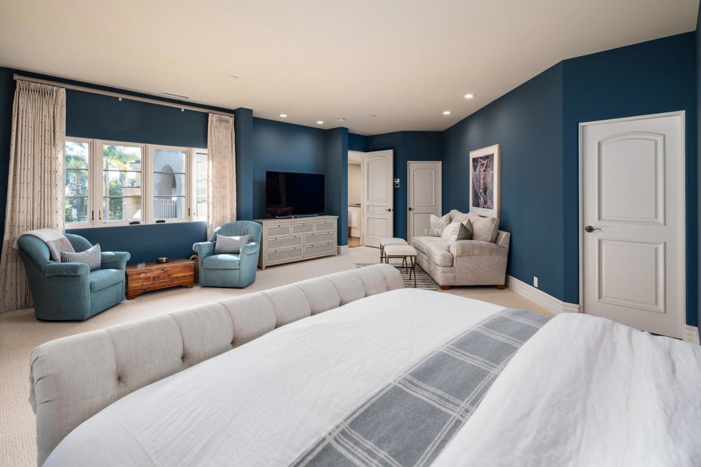 14479 Emerald Lane Rancho Santa Fe, CA 92067 - Photo 28 of 52 a living room with furniture or couch and a flat screen tv