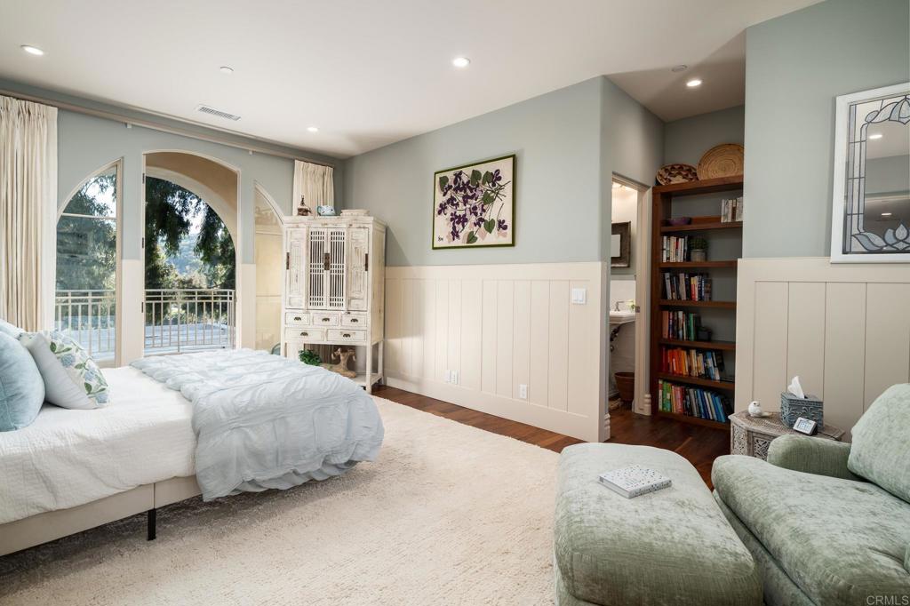 14479 Emerald Lane Rancho Santa Fe, CA 92067 - Photo 29 of 52 a bedroom with a large bed and a couch