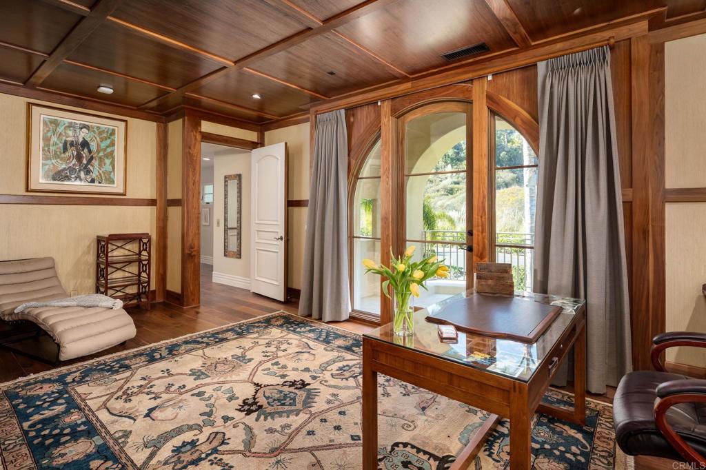 14479 Emerald Lane Rancho Santa Fe, CA 92067 - Photo 32 of 52 a bedroom with furniture and a large window