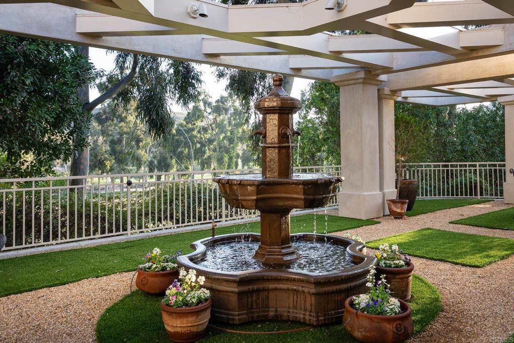14479 Emerald Lane Rancho Santa Fe, CA 92067 - Photo 37 of 52 a view of a porch with furniture and a garden