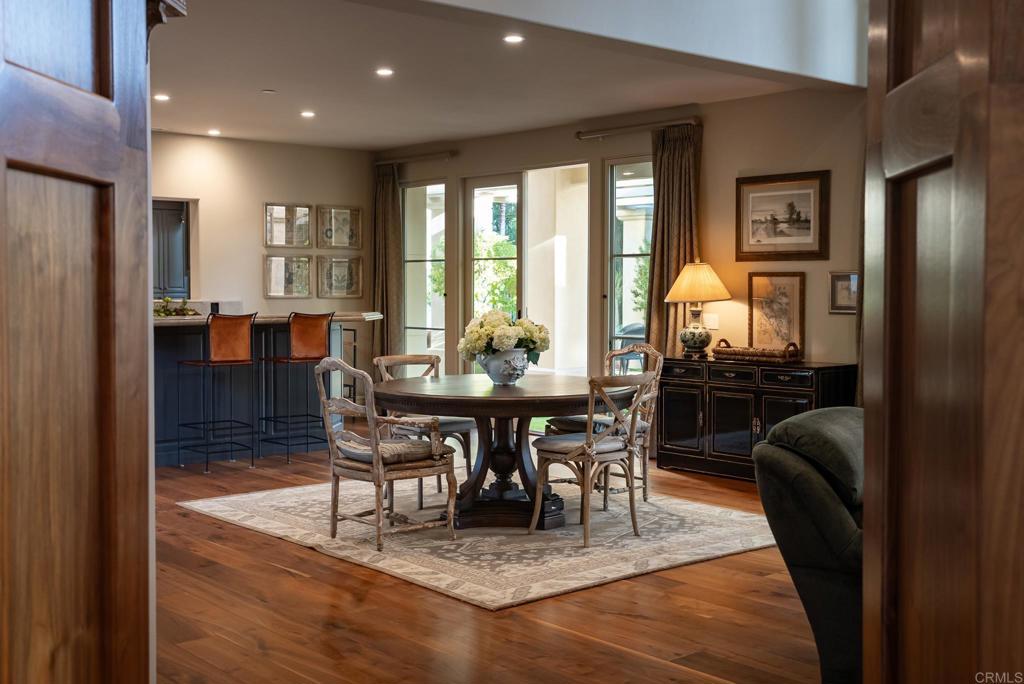 14479 Emerald Lane Rancho Santa Fe, CA 92067 - Photo 10 of 52 a view of a dining room with furniture window and wooden floor