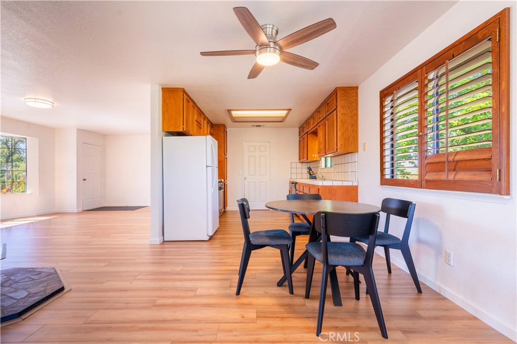 3729 Ben Hur Road Mariposa, CA 95338 - Photo 41 of 57 a view of a dining room with furniture and a window