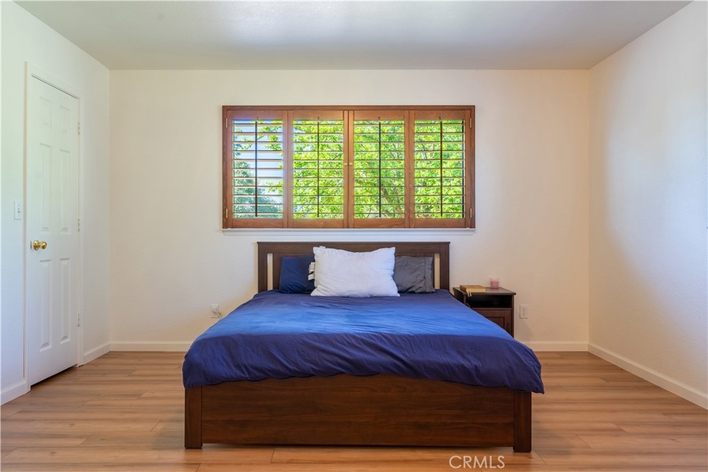 3729 Ben Hur Road Mariposa, CA 95338 - Photo 45 of 57 a large bed sitting in a bedroom next to a window