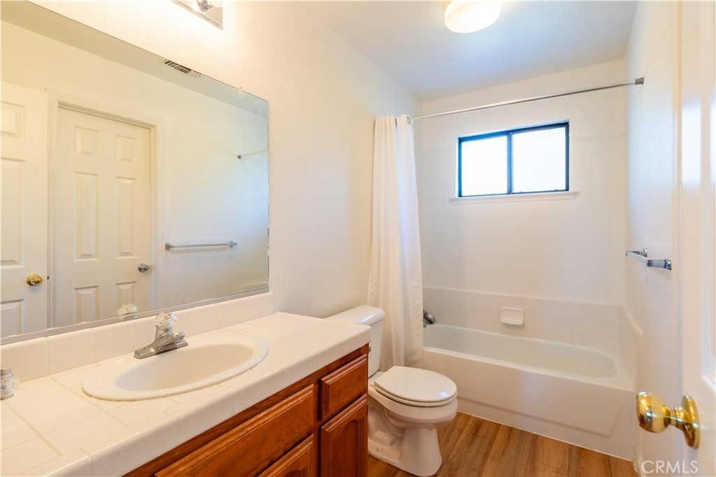 3729 Ben Hur Road Mariposa, CA 95338 - Photo 49 of 57 a bathroom with a sink a toilet and shower