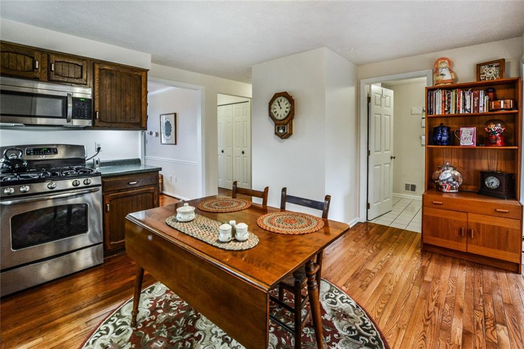 326 Butler Road Saxonburg, PA 16056 - Photo 6 of 15 Kitchen is large enough to fit a table. Laundry is conveniently located in the room behind.