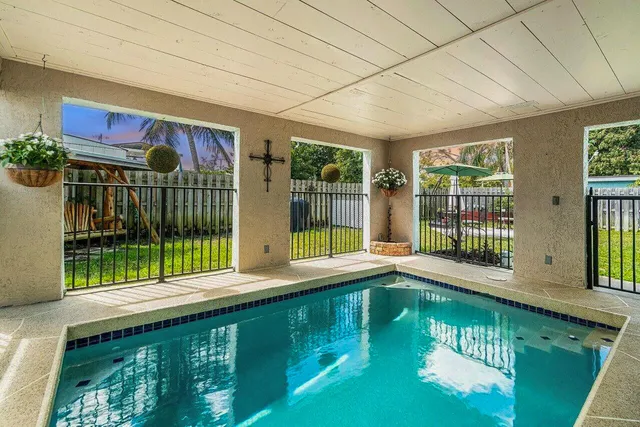 a view of a house with a swimming pool