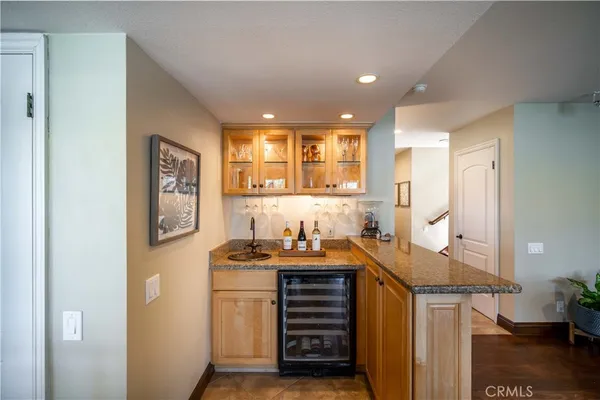 a dining room with furniture and a glass door