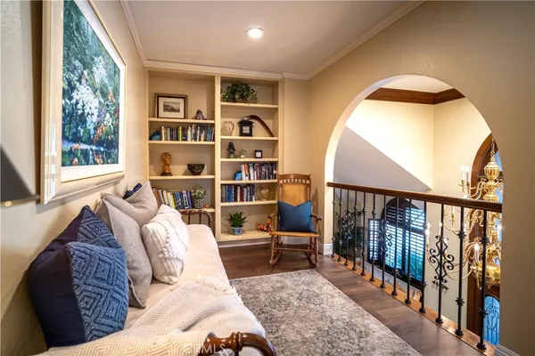 a bedroom with a bed and ceiling fan