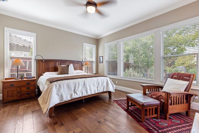 a bathroom with a granite countertop sink mirror and double