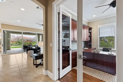 a view of a room with furniture and window