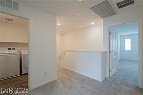 12347 Indigo Montage Road, Unit 3 Las Vegas, NV 89183 - Photo 18 of 23 Conveniently located laundry space and an open landing area await on the upper level.