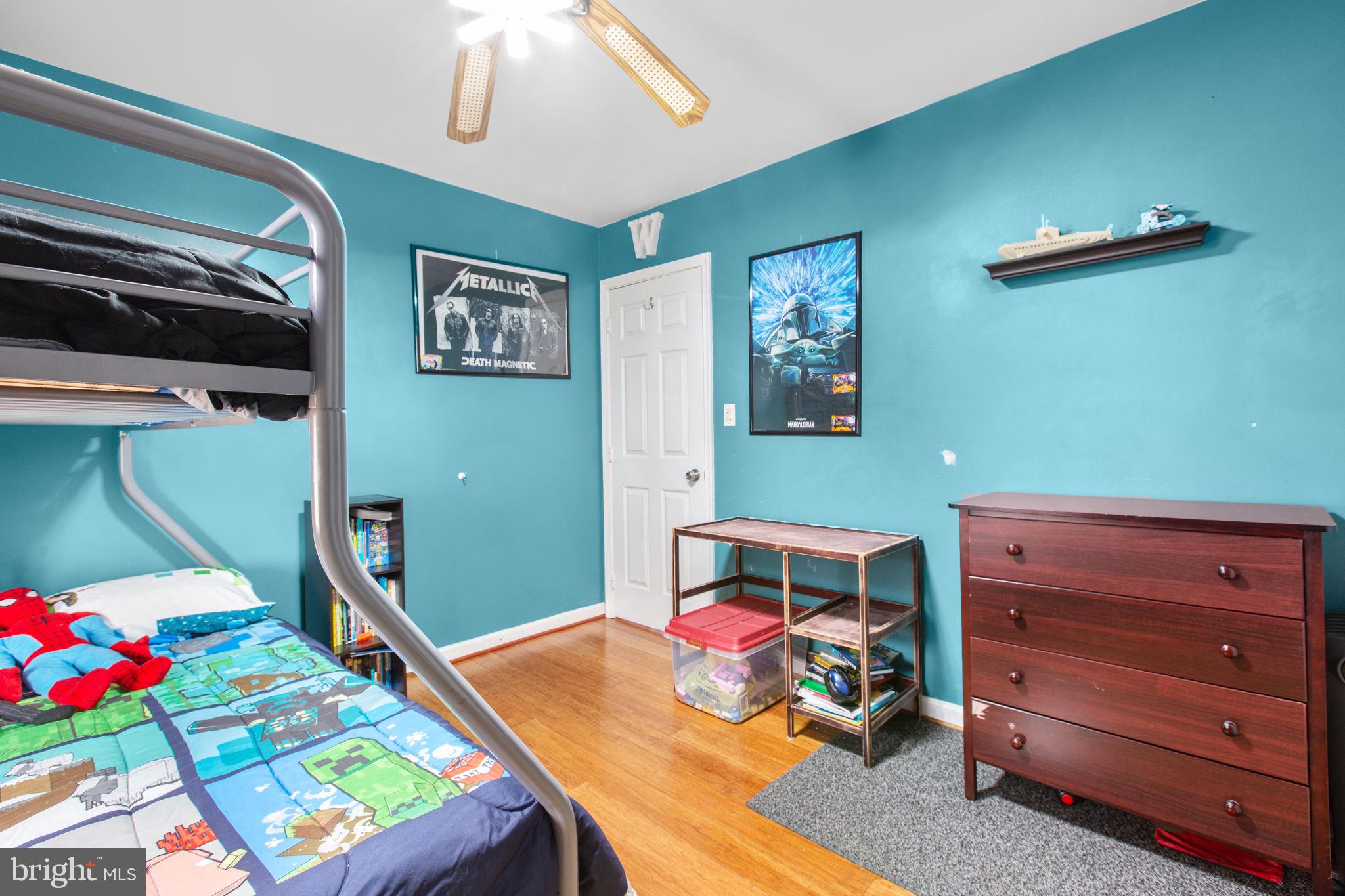 9408 Stonegate Lane Rhoadesville, VA 22542 - Photo 16 of 33 Ceiling fan and hardwood floors