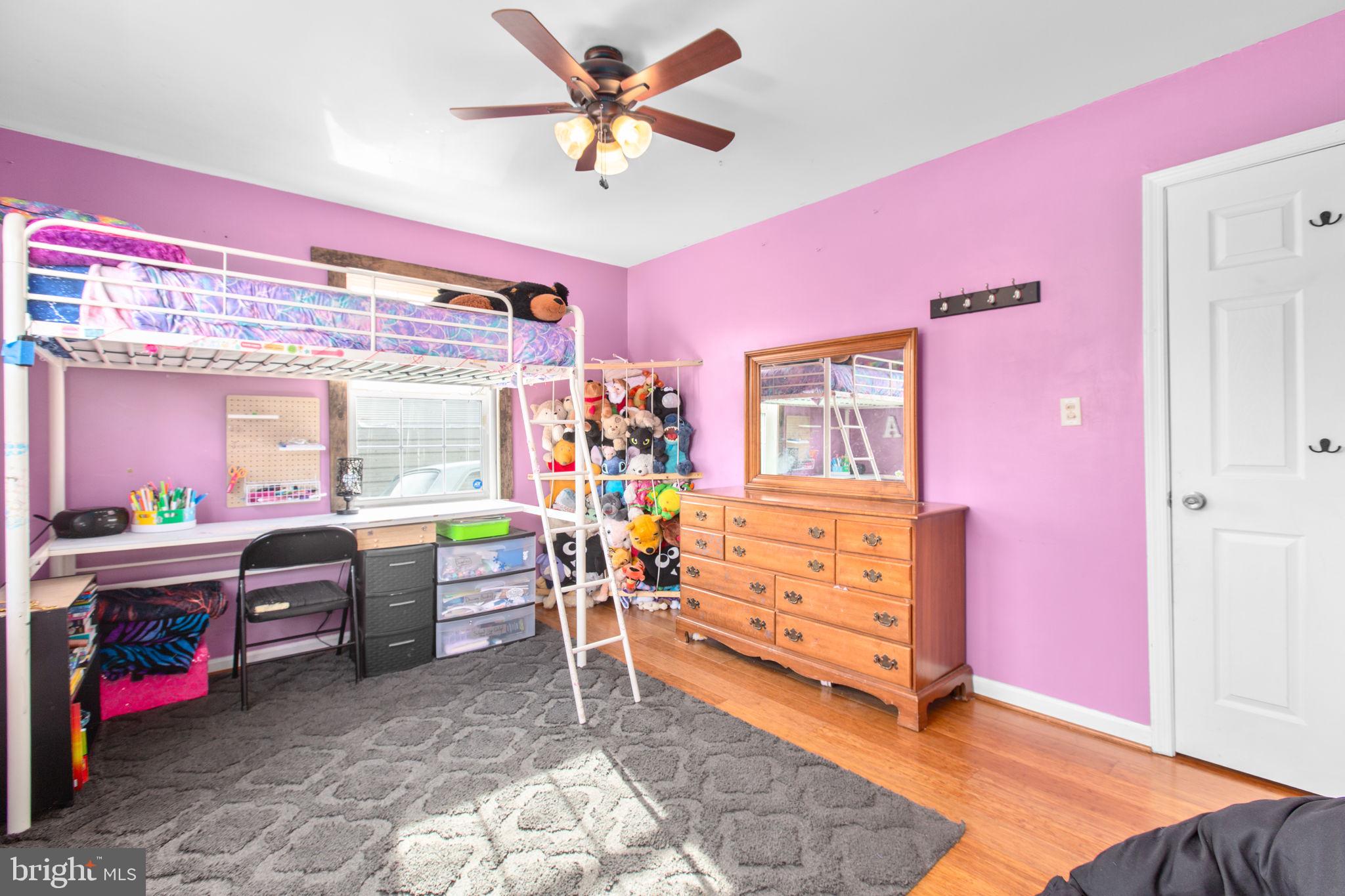 9408 Stonegate Lane Rhoadesville, VA 22542 - Photo 18 of 33 Ceiling fan and hardwood floors
