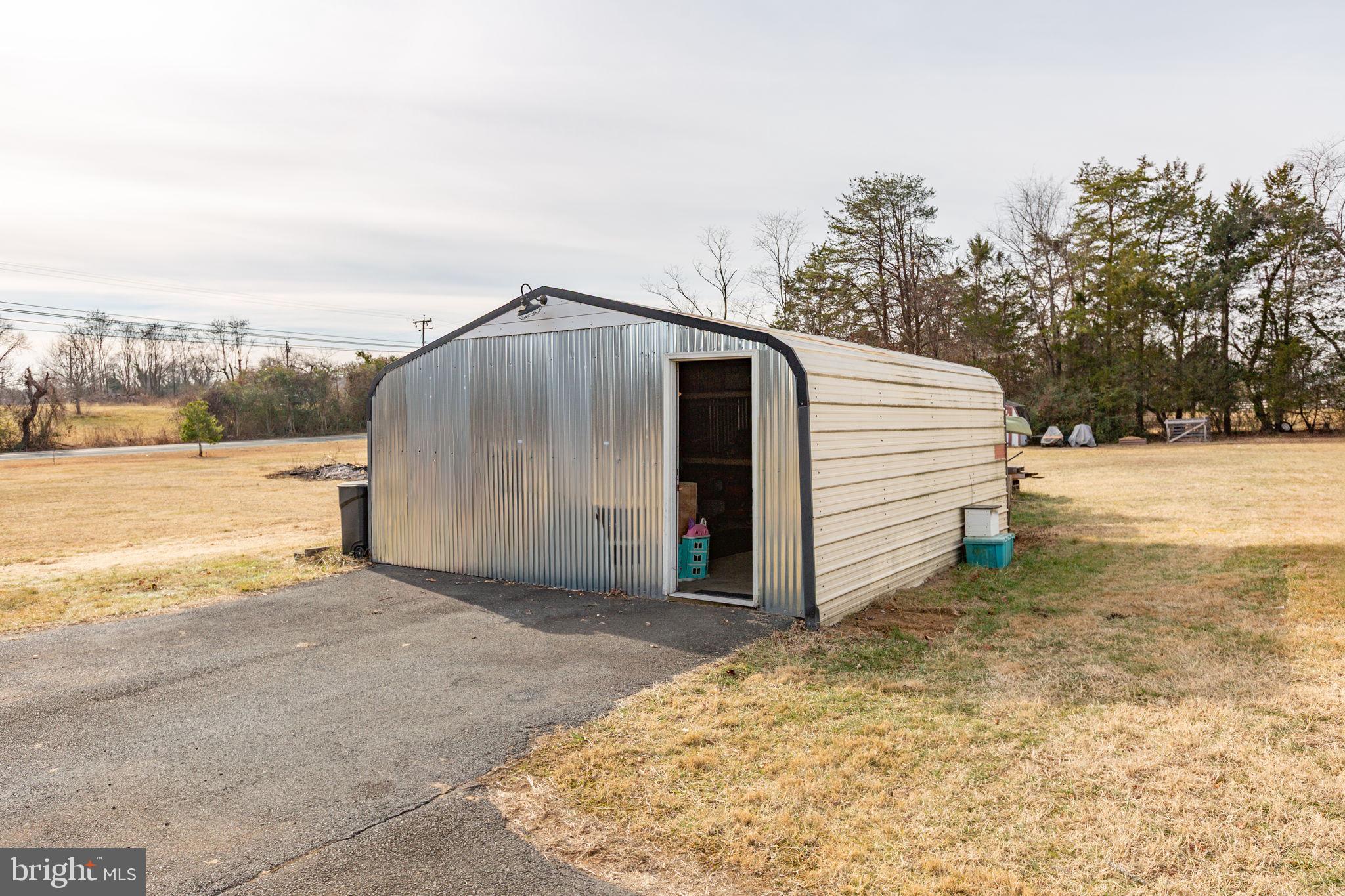 9408 Stonegate Lane Rhoadesville, VA 22542 - Photo 24 of 33 Large shed for storage or workshop