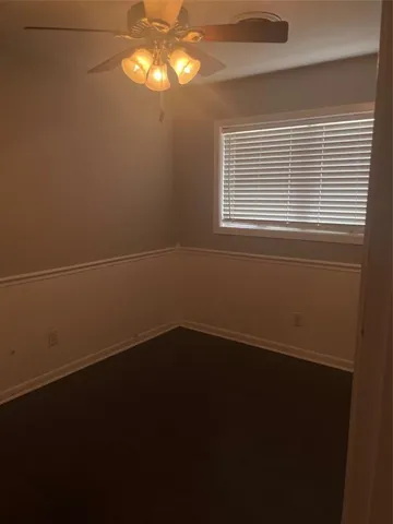 a view of a room that has a window in it