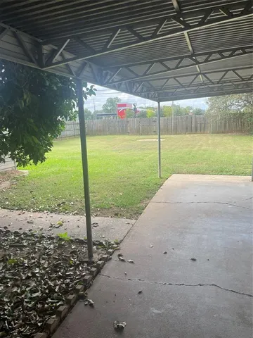 a view of a backyard of a house