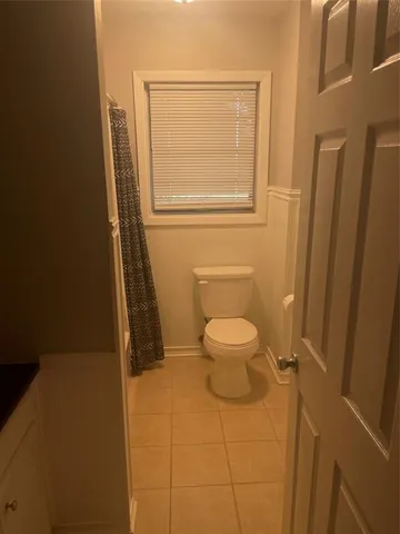 a bathroom with a toilet