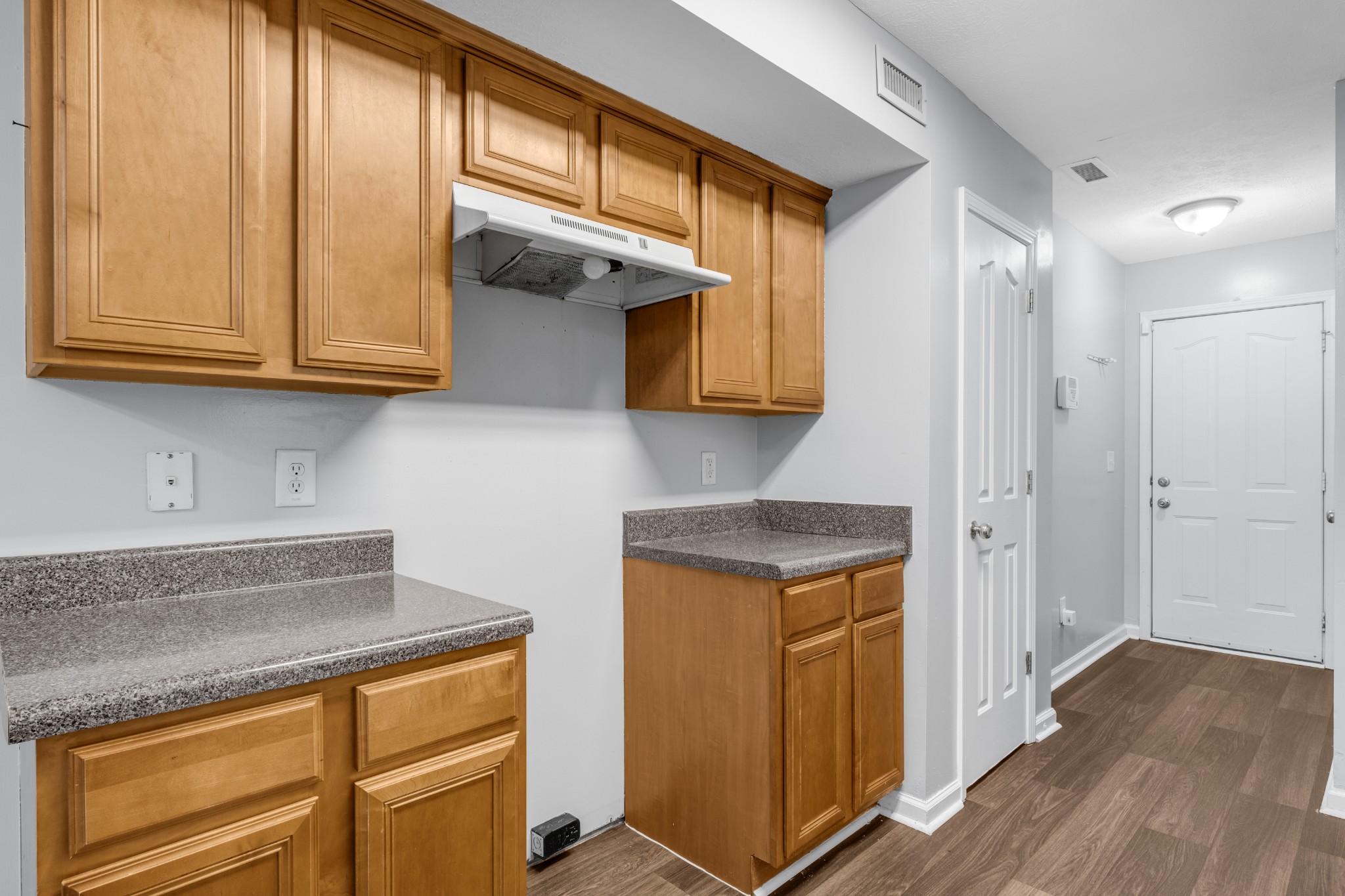 809 Dover Glen Drive Antioch, TN 37013 - Photo 11 of 23 a kitchen with stainless steel appliances granite countertop wooden cabinets and a counter top space