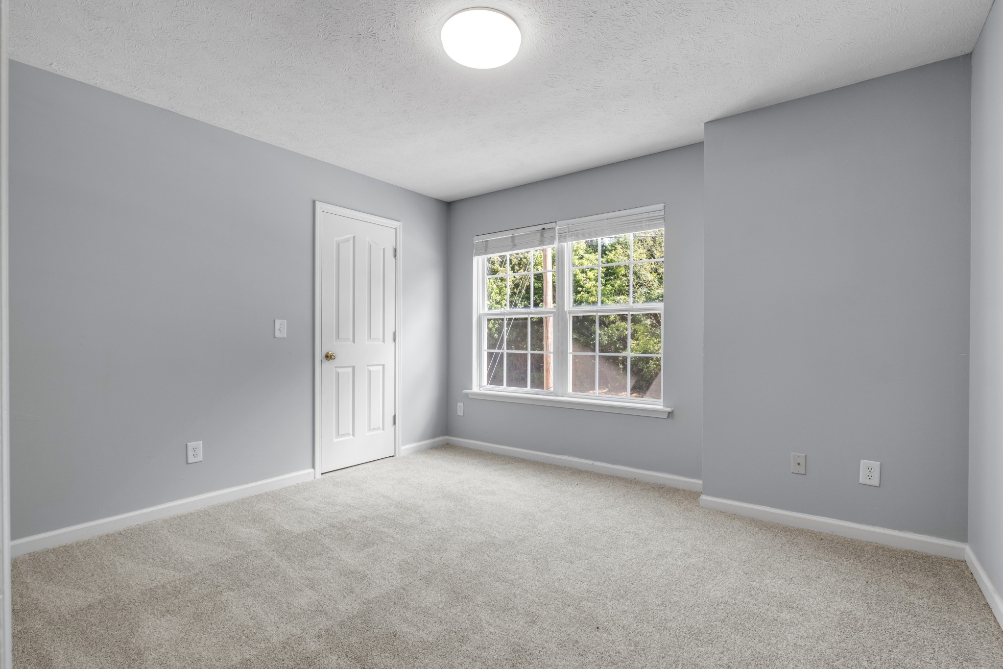 809 Dover Glen Drive Antioch, TN 37013 - Photo 19 of 23 an empty room with windows