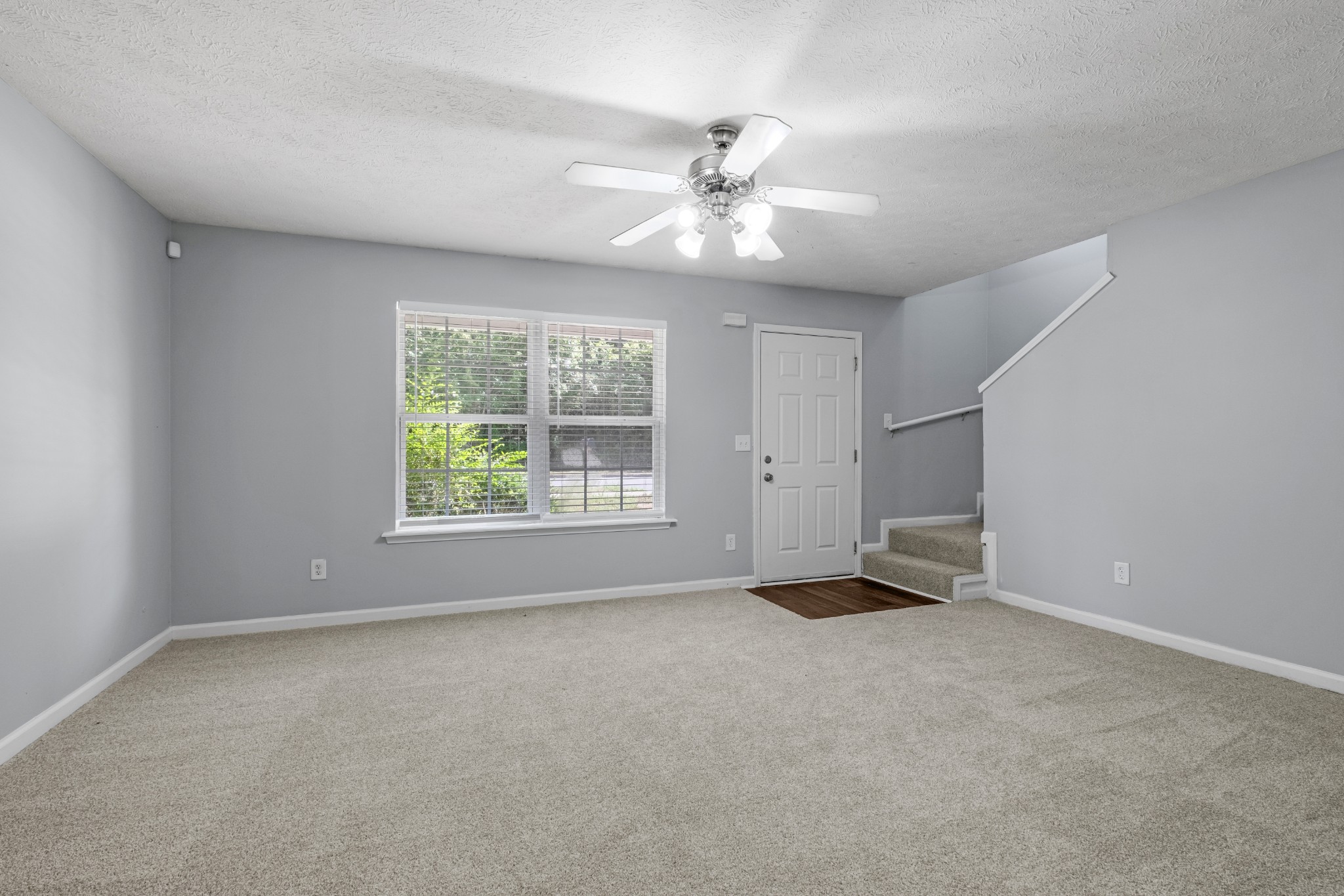 809 Dover Glen Drive Antioch, TN 37013 - Photo 6 of 23 an empty room with windows and fan