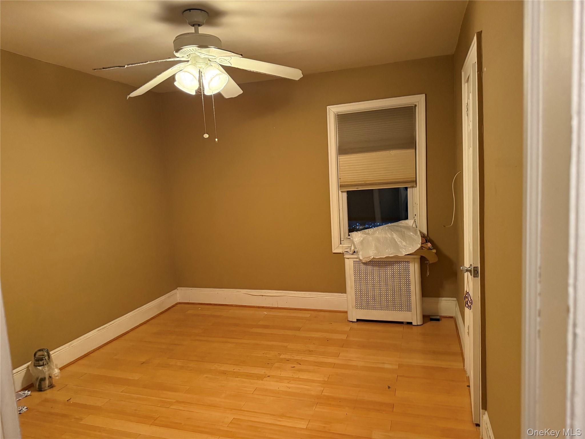 85 Bucknell Road Valley Stream, NY 11580 - Photo 7 of 15 wooden floor in an empty room