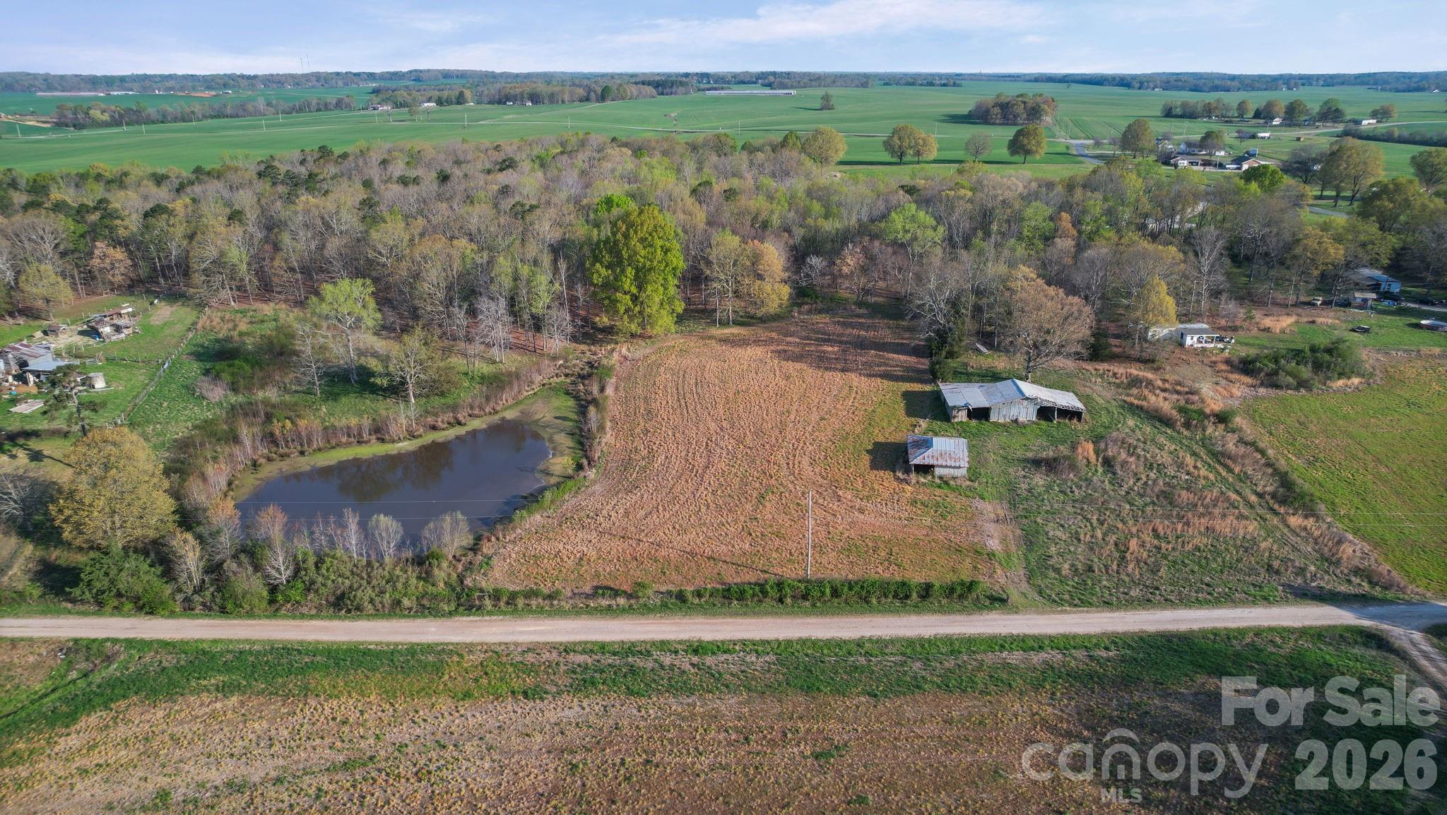 0 Rape Road Monroe, NC 28112 - Photo 12 of 21 an aerial view of a houses with outdoor space and trees