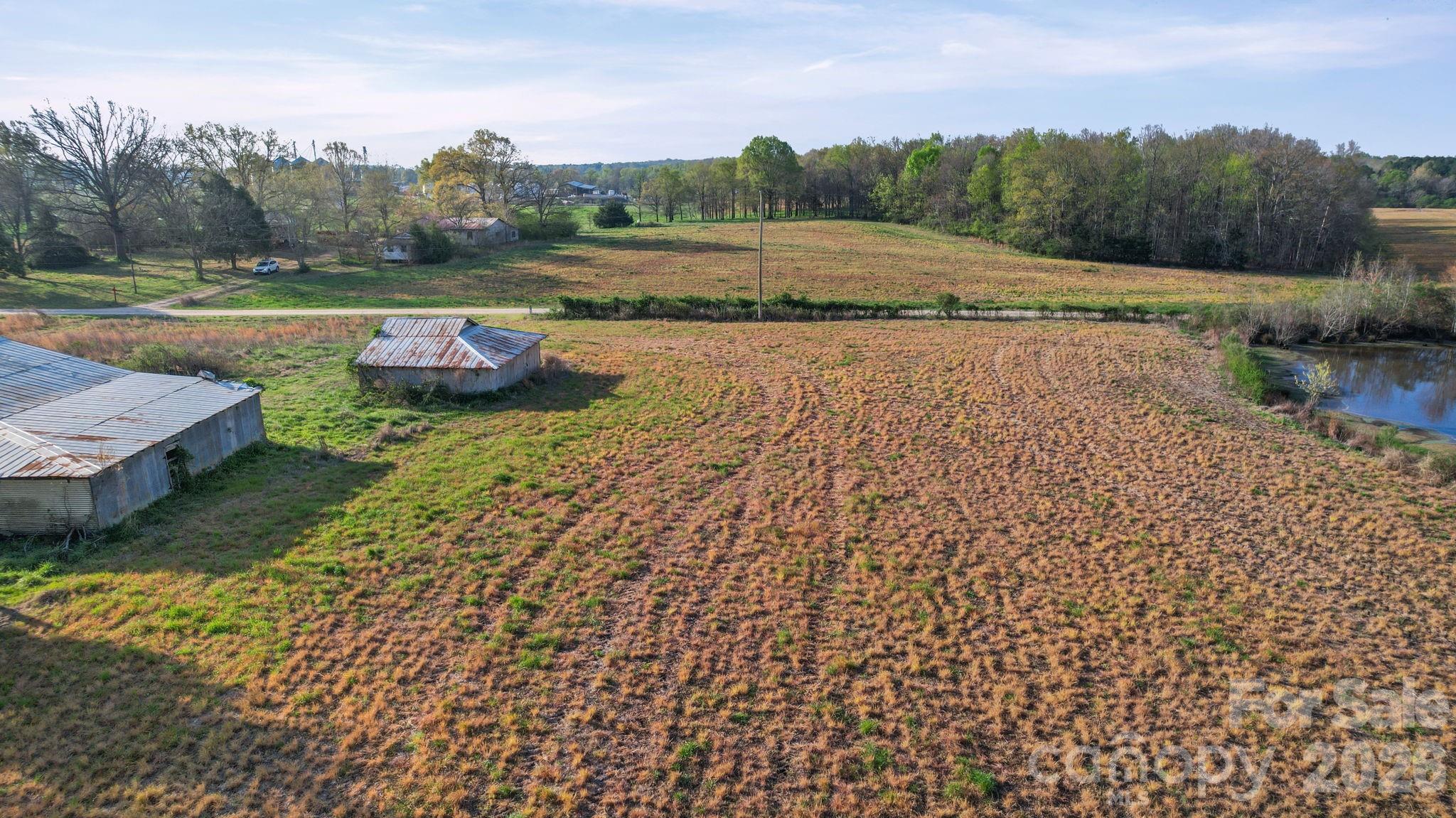 0 Rape Road Monroe, NC 28112 - Photo 18 of 21 a view of a lake with outdoor space