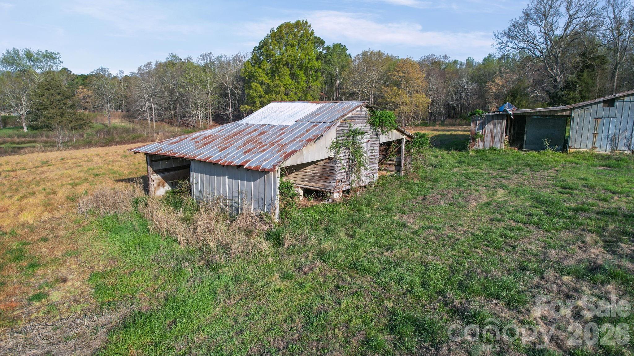 0 Rape Road Monroe, NC 28112 - Photo 21 of 21 a view of a house with pool and a yard