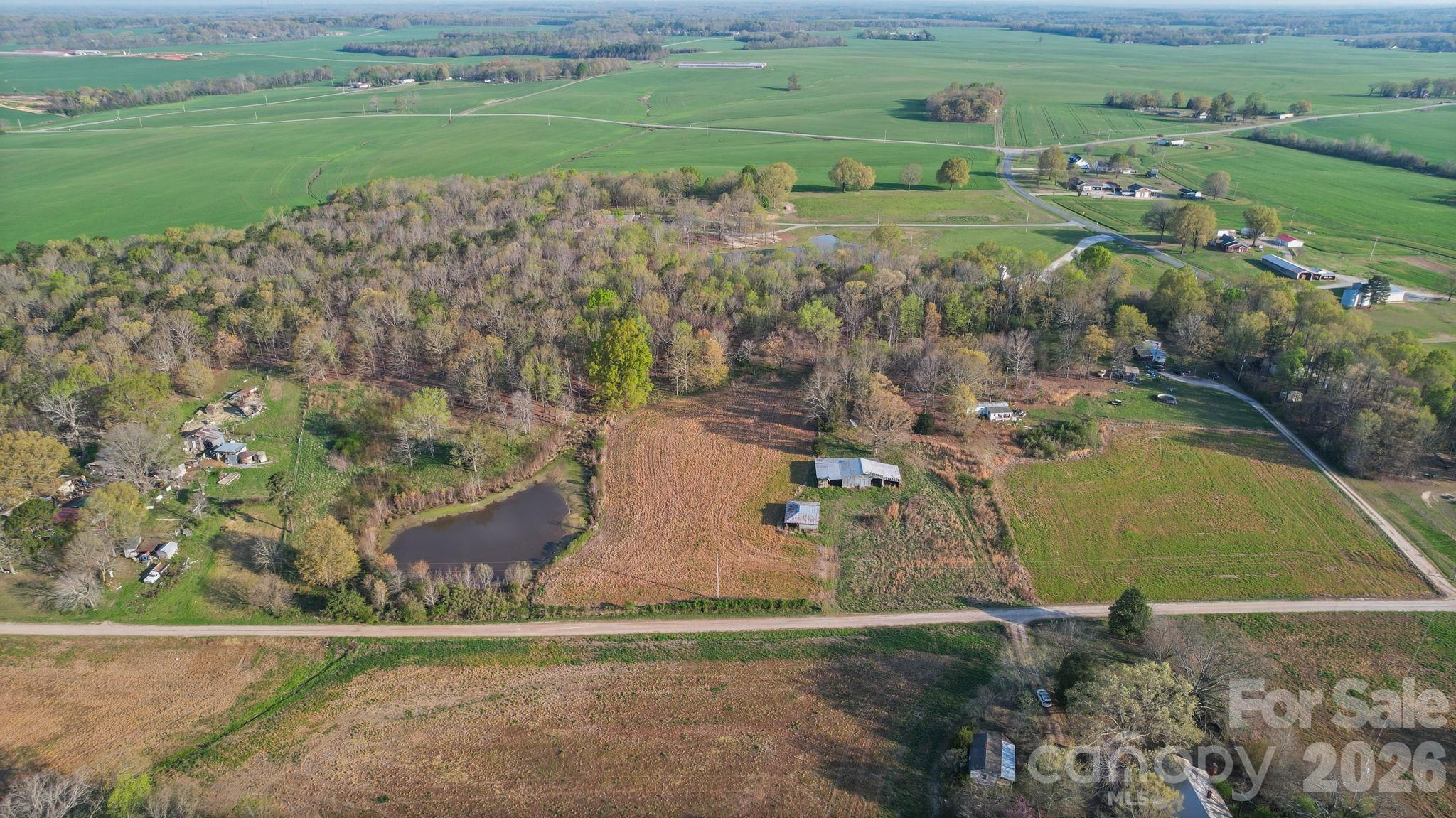 0 Rape Road Monroe, NC 28112 - Photo 4 of 21 an aerial view of a house with a yard