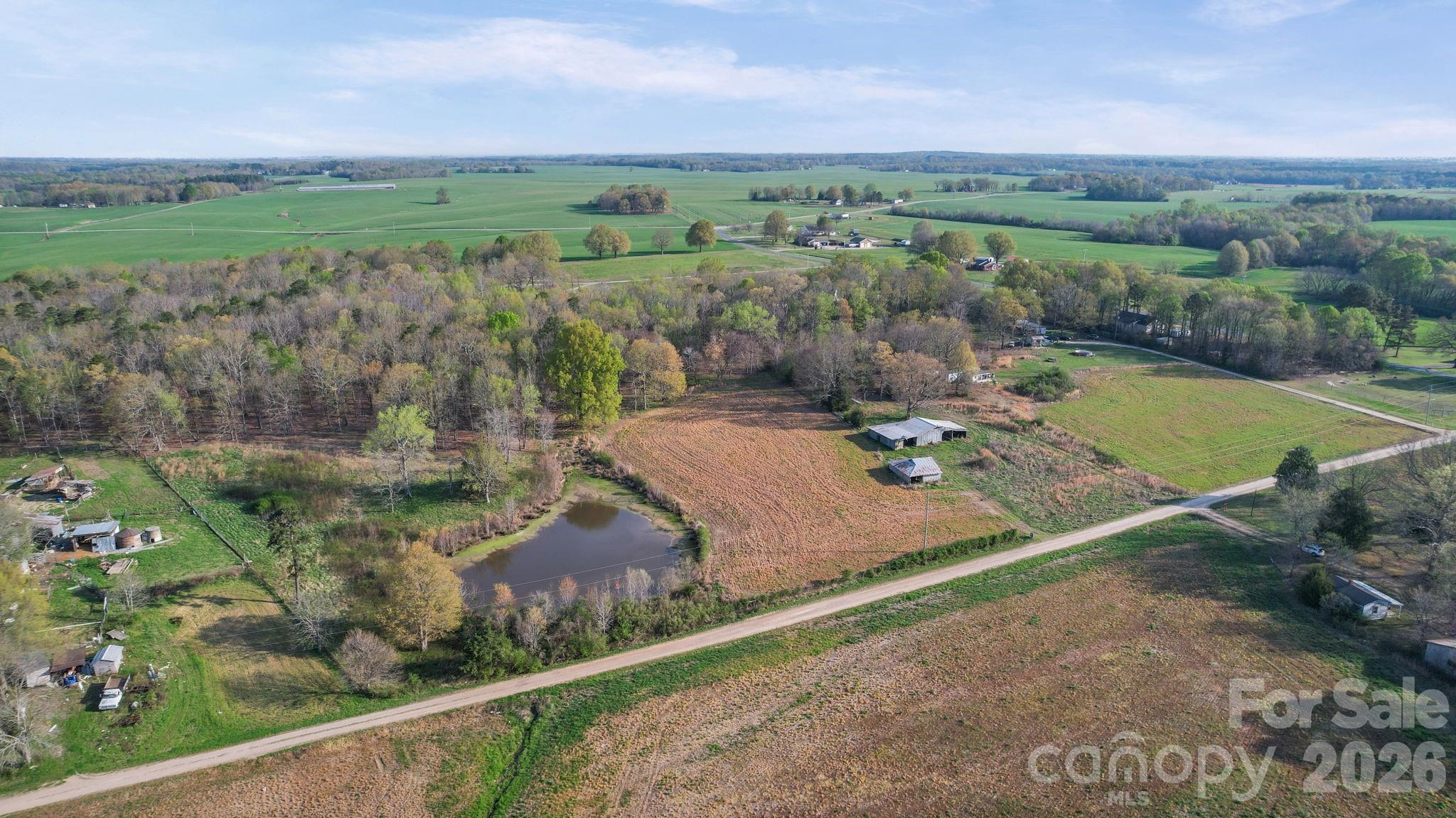 0 Rape Road Monroe, NC 28112 - Photo 5 of 21 an aerial view of a house with a yard