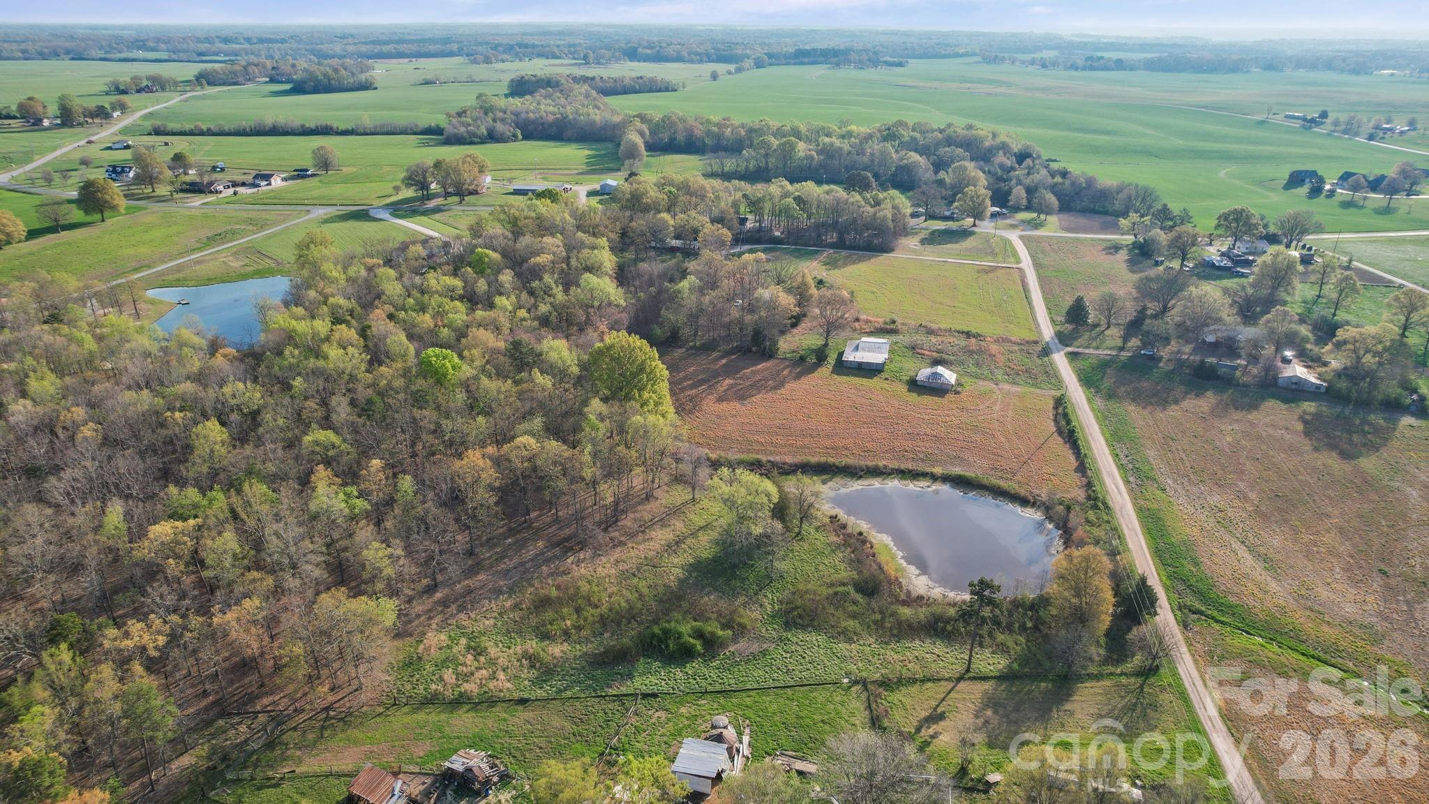 0 Rape Road Monroe, NC 28112 - Photo 6 of 21 an aerial view of a house with a yard