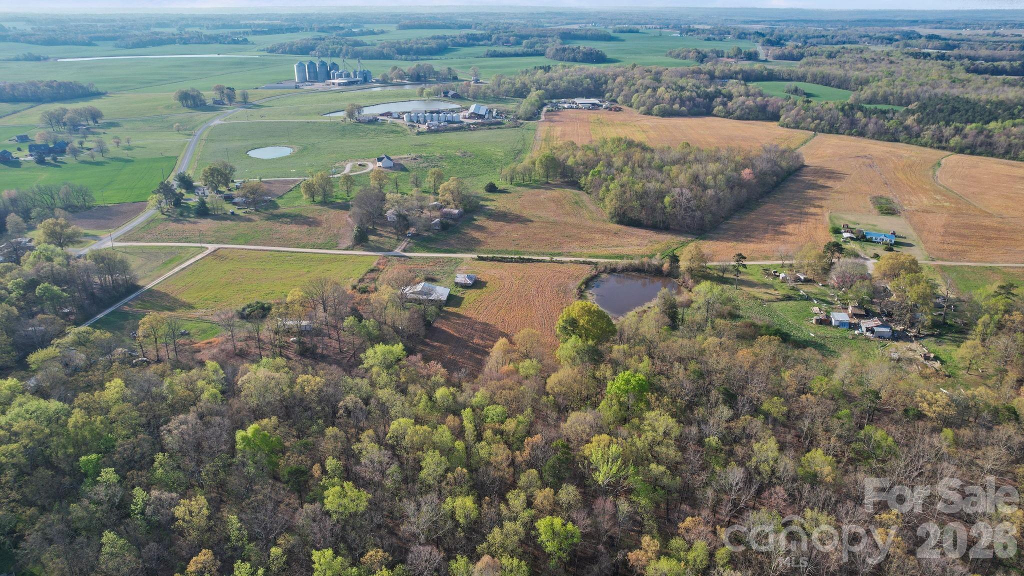 0 Rape Road Monroe, NC 28112 - Photo 7 of 21 an aerial view of a houses with outdoor space and lake view