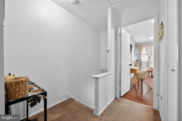 a view of a room that has a bench in it