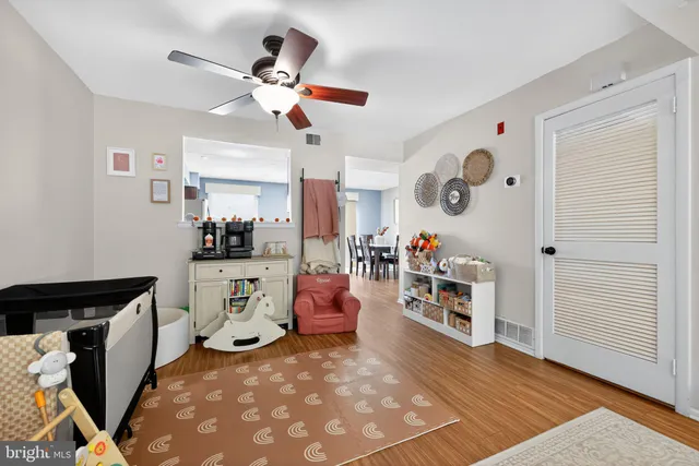 a view of a workspace with furniture and workspace