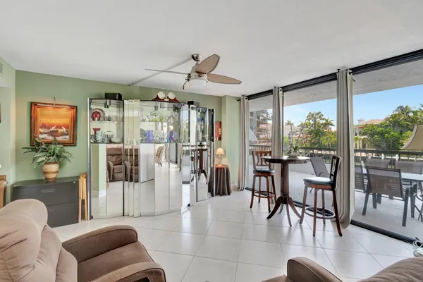 a kitchen with stainless steel appliances granite countertop a sink and a stove
