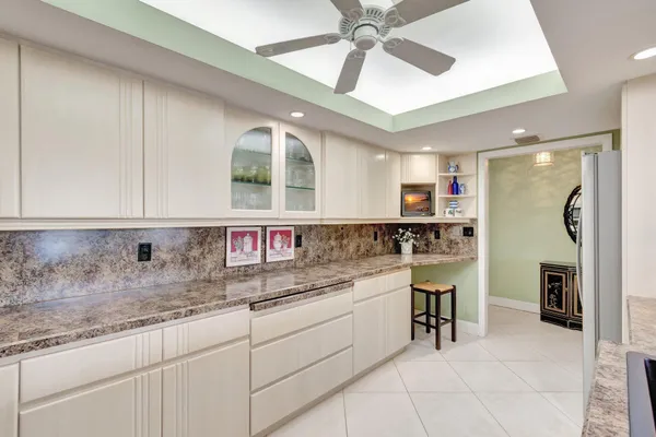 a view of a chairs and table in patio