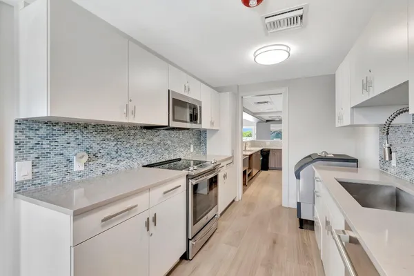 $695,000 | 4740 South Ocean Boulevard, Unit 202, Highland Beach, FL 33487