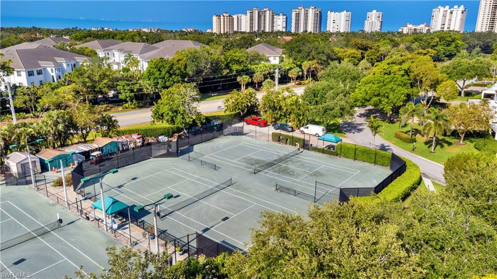 565 Beachwalk Circle, Unit T102 Naples, FL 34108 - Photo 28 of 33 an aerial view of a house