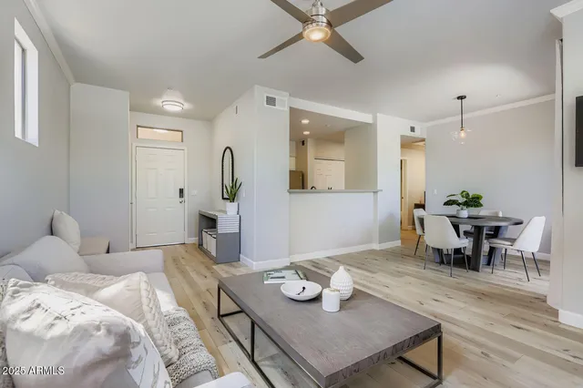 a view of a balcony with chairs