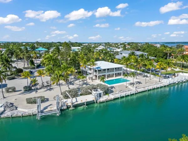 a view of a lake with a yard