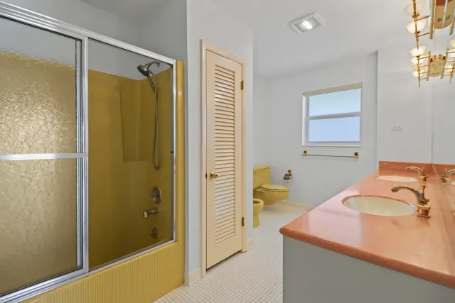 a view of a room with a large window