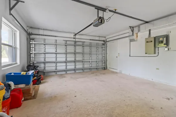 a view of a livingroom with storage and utility