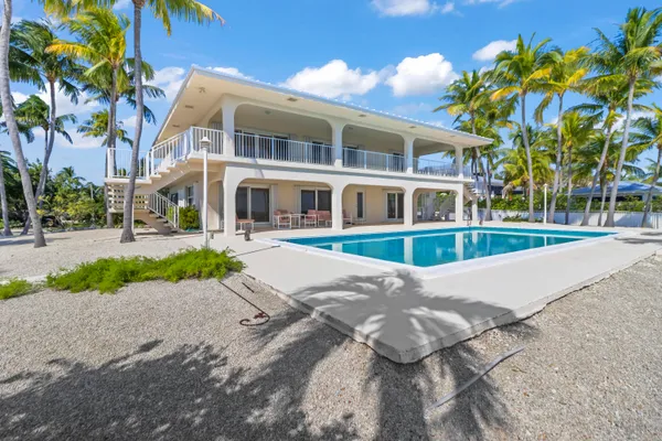 a front view of a building with street view