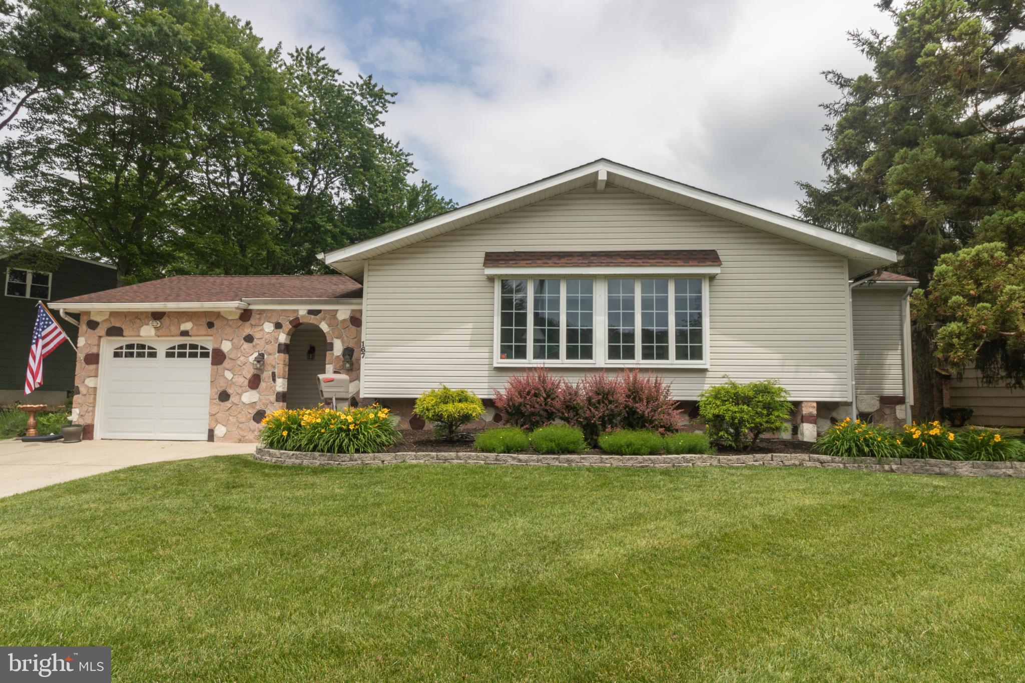167 Canterbury Road Mount Laurel, NJ 08054 - Photo 1 of 50 Charming home with lush landscaping and flag.